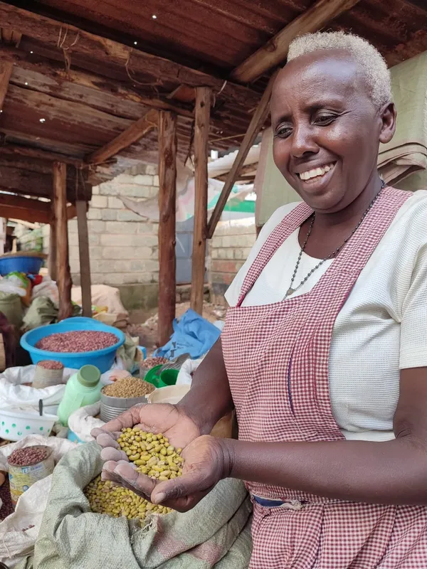 Female trader at her cereal shop representing smallholder farmers in Busia, Kenya